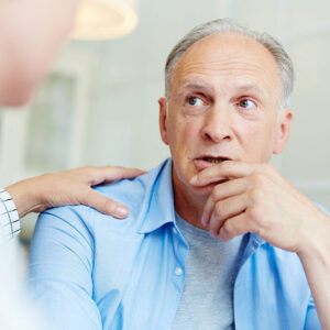 concerned older man receiving advice