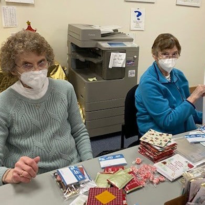 volunteers helping at SeniorCare office