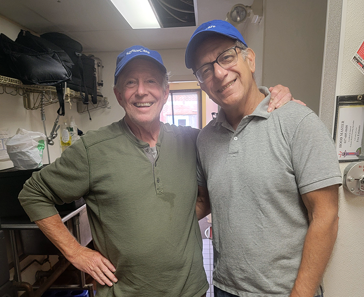 Two volunteers for the Meals on Wheels home delivered meals program